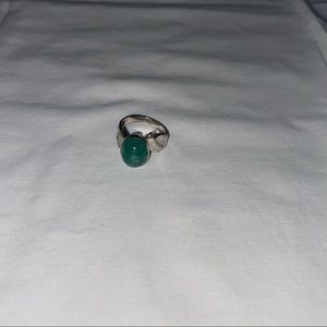 Green and silver ring